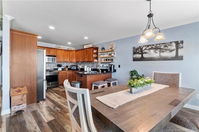 Dining area with view of the kitchen counter with 