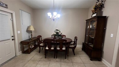 DINING AREA OPEN TO KITCHEN