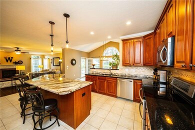 Enormous kitchen with custom 2 tone granite, 14' i