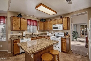 Kitchen with look-thru to Formal Dining