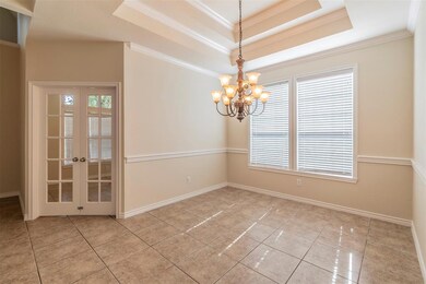 Just inside the front entry is your home office wi