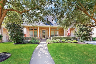 The large front porch is perfect for rocking chairs or a bench.