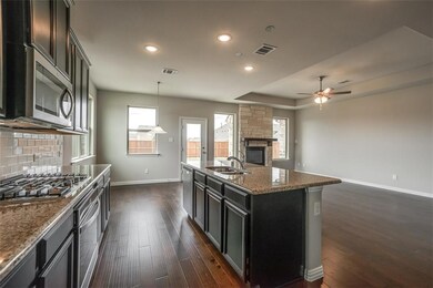 Kitchen opens up directly to the breakfast area an