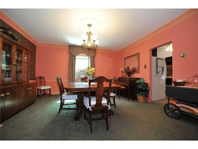 Dining Room. Large with rear view, crown molding