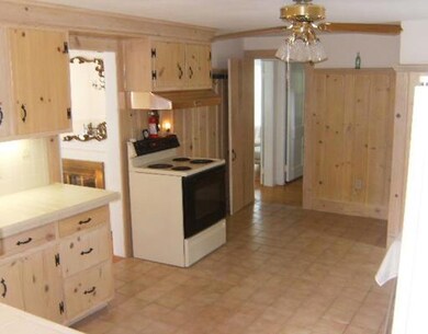 Kitchen. All appliances remain in this large eat i