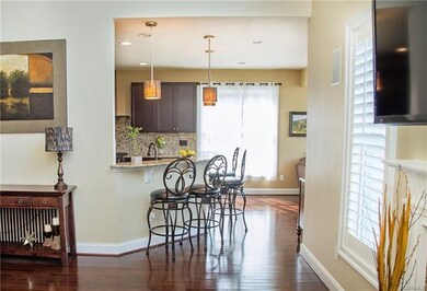 Kitchen open to family room breakfast bar and morn
