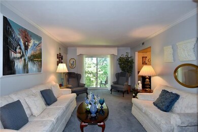 The sizable living room measures 18' x 12'.