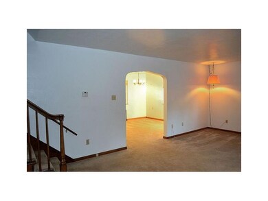 Living Room. Most of the rooms have newer carpetin