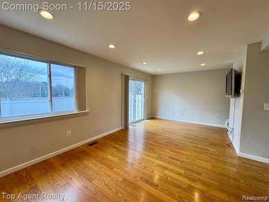 Empty room with recessed lighting and light wood-type flooring