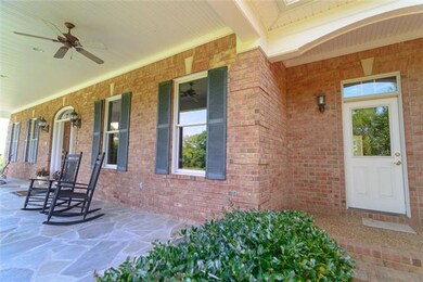 Rocking chairs for relaxing or room to party on over 40 feet of length on front porch.