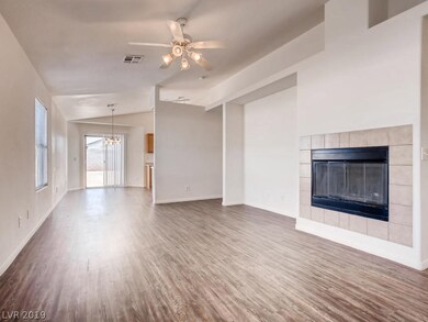 Entertainment niche' and fireplace in living room