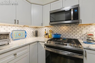 Custom tile backsplash and stone counters