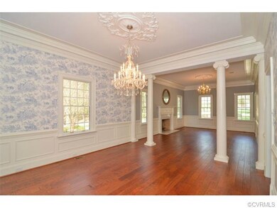 Stunning Formal Dining Area with Beautiful Chandel