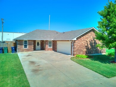 Single story home with a shingled roof, a front lawn, and driveway