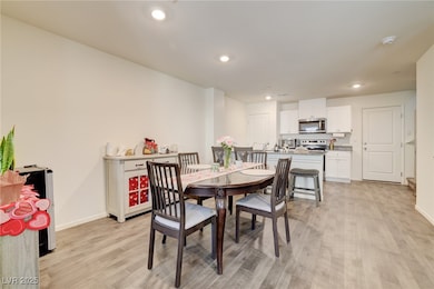 Dining space featuring light hardwood / wood-style