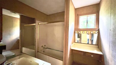 Full bathroom featuring vanity, combined bath / sh