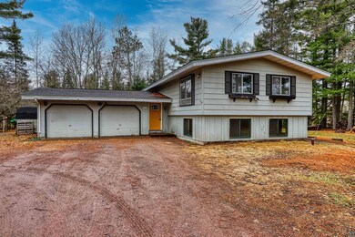 Split level home featuring an attached garage and 