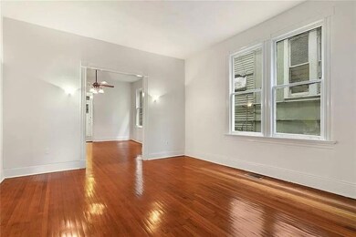 GLEAMING PINE FLOORS THROUGHOUT. FRONT ENTRANCE OP