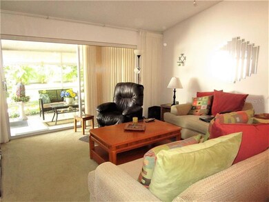 Living room/Dining room combination has sliding gl