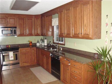 The Kitchen has been recently updated with new Appliances, Cabinets, and Granite Countetops.