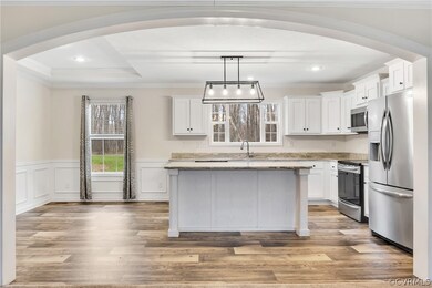 Kitchen featuring light hardwood / wood-style floo