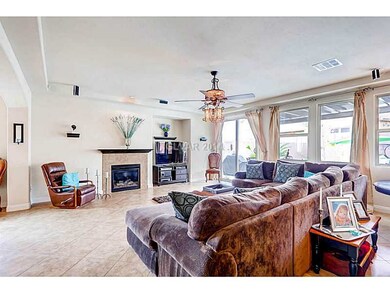 Den. GAS FIREPLACE WITH MATCHING MANTEL FOR THE CO