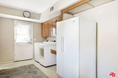 Kitchen with Laundry Area