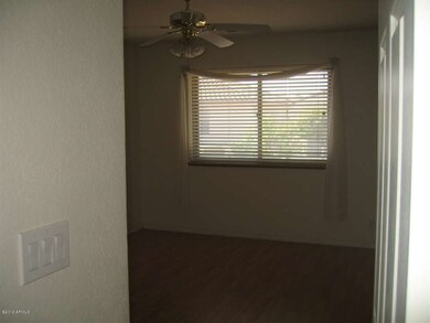 guest room with wod laminate floor