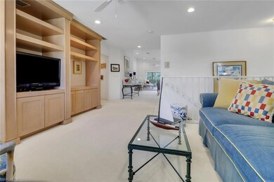 Living room featuring recessed lighting, ceiling f