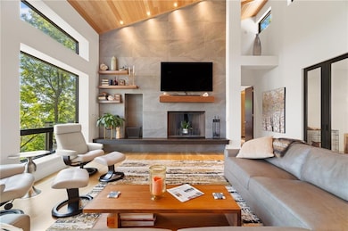 DTBB great room is very similar, but ceiling will slope in the opposite direction, back window wall will be two feet higher, and back wall window will have a fixed window above the operable window