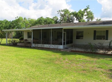 Covered open and screened back porches with a seco