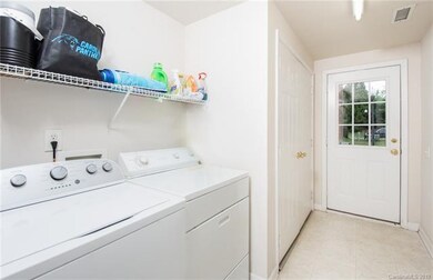 Main level Laundry Room. Back door for ease of sec