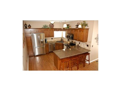 Gorgeous granite countertops and large peninsula w