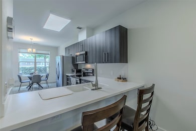 Kitchen featuring appliances with stainless steel