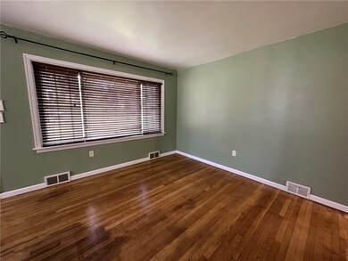 As you enter this home the hardwood floors invite
