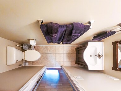Full bathroom with toilet