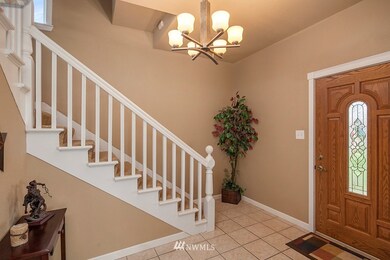 Grand entry leading from quintessential farm front porch! Many modern features meet vintage styles