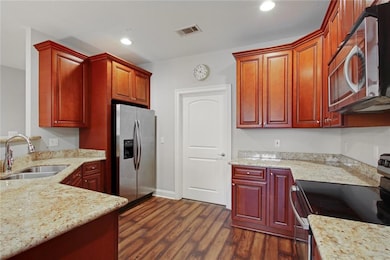 Stainless steel appliances and granite countertops