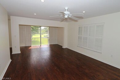 Empty room with dark wood-type flooring and ceilin