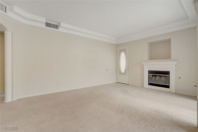 Plenty of wall space and TV over fireplace