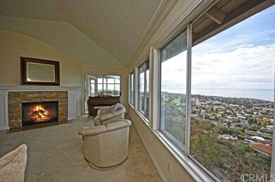 Formal living has sliders leading into sunroom.