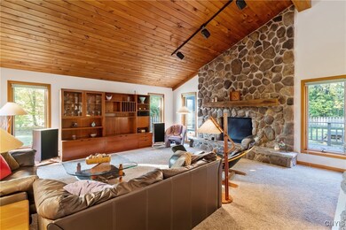 Great Room w/ wood-burning fireplace.