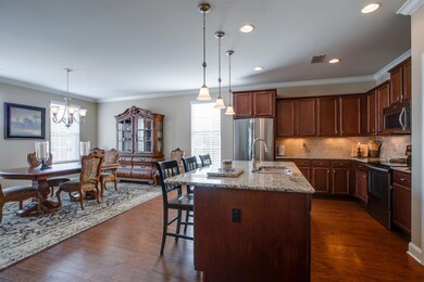 The main level of the home has hardwood floors, neutral paint , crown molding and all windows have 2