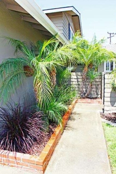 Entry into the enclosed front yard area leading to