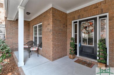 Full Brick ~ Covered Front Porch ~ Gutters