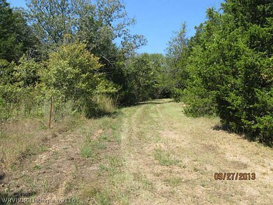 View. Driveway view from the Hwy.
