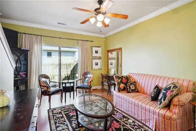 Roomy and bright, the living room can accomodate l