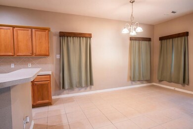 Breakfast room off the kitchen with large bar perf