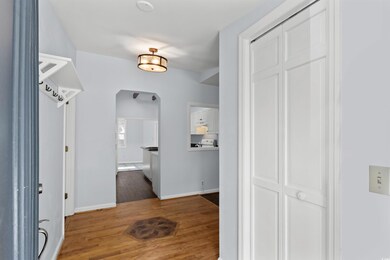 Hall featuring wood-type flooring