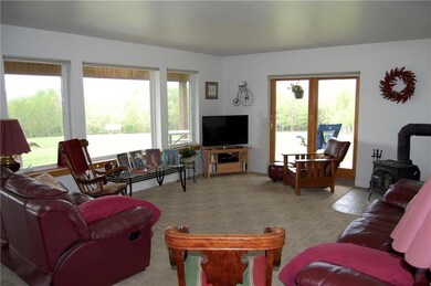 The family room offers a warm and...